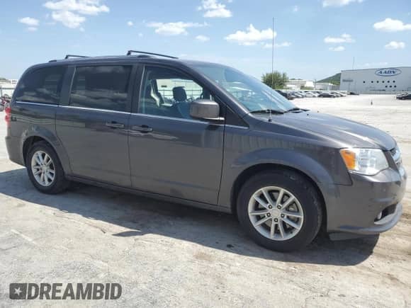 2020 Dodge Grand Caravan SXT with VIN 2C4RDGCG0LR161567, listed as a Copart auction lot 67039855 with 103,284 mi miles and Salvage title. Bid and sale history available at DreamBid. Image 4.