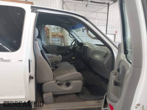 2000 Ford F-150 XL with VIN 1FTRX18L2YNA87843, listed as a IAAI auction lot 43184366 with 233,131 mi miles and . Bid and sale history available at DreamBid. Image 5.