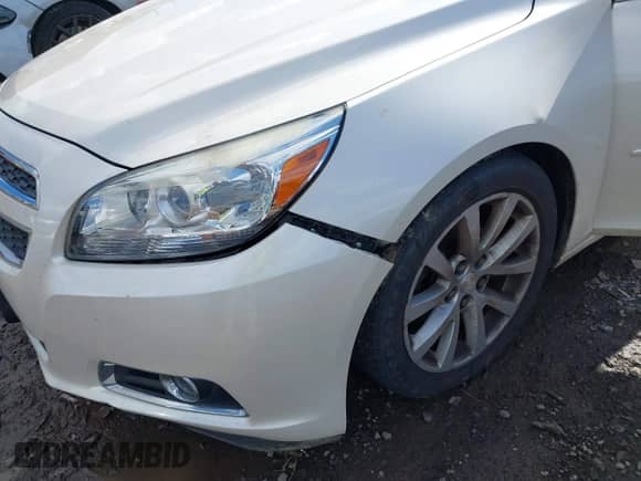 2013 Chevrolet Malibu LT z VIN 1G11E5SAXDF178485, wystawiony jako IAAI lot #43399346 z przebiegiem 143 805 mil mil oraz . Historia ofert i sprzedaży dostępna na DreamBid. Obrazek 6.