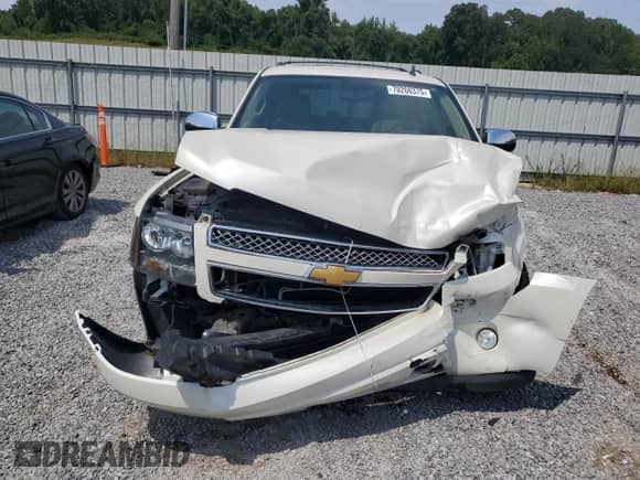 2012 Chevrolet Suburban LTZ с VIN 1GNSCKE06CR118100, выставлен на аукционе Copart как лот 70266375 с пробегом 142 691 миль миль и Списание • Salvage title. История ставок и продаж доступна на DreamBid. Изображение 5.