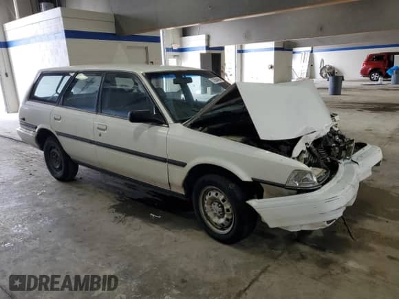 1991 Toyota Camry z VIN JT2SV21W7M0380204, wystawiony jako Copart lot #72694404 z przebiegiem 242 162 mil mil oraz Szkoda całkowita • Salvage title. Historia ofert i sprzedaży dostępna na DreamBid. Obrazek 4.