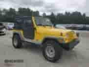 2000 Jeep Wrangler SE with VIN 1J4FA29P0YP775110, listed as a Copart auction lot 71498795 with 72,782 mi miles and Clean title. Bid and sale history available at DreamBid. Image 4.