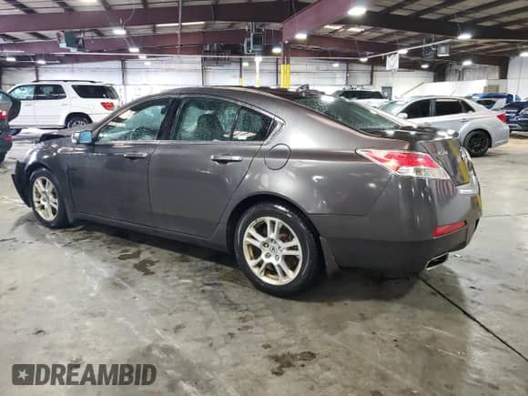 2009 Acura TL с VIN 19UUA86299A005518, выставлен на аукционе Copart как лот 82152565 с пробегом 115 120 миль миль и Списание • Salvage title. История ставок и продаж доступна на DreamBid. Изображение 2.