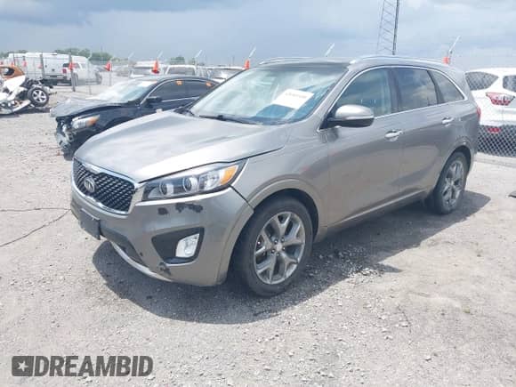 2016 Kia Sorento SXL with VIN 5XYPK4A58GG115170, listed as a IAAI auction lot 42689300 with 123,640 mi miles and . Bid and sale history available at DreamBid. Image 2.