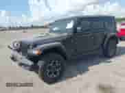 2023 Jeep Wrangler Rubicon with VIN 1C4JJXR60PW568189, listed as a IAAI auction lot 42188577 with 18,615 mi miles and . Bid and sale history available at DreamBid. Image 2.