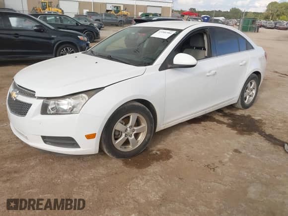 2014 Chevrolet Cruze 1LT с VIN 1G1PC5SB9E7151086, выставлен на аукционе IAAI как лот 43306584 с пробегом 155 405 миль миль и . История ставок и продаж доступна на DreamBid. Изображение 2.