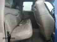 2002 Chevrolet Silverado 1500 LS z VIN 2GCEK19T621134585, wystawiony jako Copart lot #82629095 z przebiegiem 154 674 mil mil oraz Czysty tytuł • Clean title. Historia ofert i sprzedaży dostępna na DreamBid. Obrazek 10.