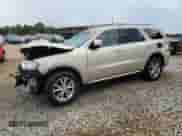 2014 Dodge Durango Limited with VIN 1C4RDHDG8EC443410, listed as a Copart auction lot 61386365 with 115,570 mi miles and Salvage title. Bid and sale history available at DreamBid. Image 1.