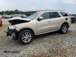 2014 Dodge Durango Limited with VIN 1C4RDHDG8EC443410, listed as a Copart auction lot 61386365 with 115,570 mi miles and Salvage title. Bid and sale history available at DreamBid. Image 1.