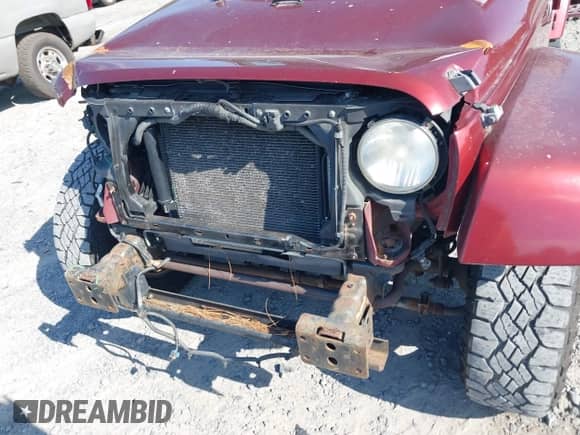 2007 Jeep Wrangler Unlimited Sahara z VIN 1J8GA59187L211825, wystawiony jako IAAI lot #42313099 z przebiegiem 107 554 mil mil oraz . Historia ofert i sprzedaży dostępna na DreamBid. Obrazek 6.