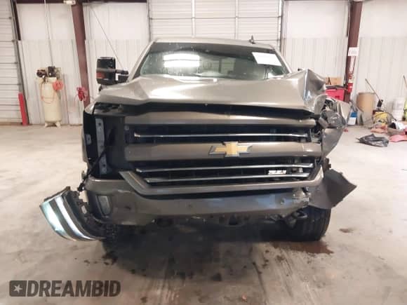 2017 Chevrolet Silverado 1500 LTZ z VIN 3GCUKSEJ4HG328926, wystawiony jako IAAI lot #41125958 z przebiegiem 248 071 mil mil oraz . Historia ofert i sprzedaży dostępna na DreamBid. Obrazek 13.