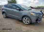 2014 Ford Escape SE with VIN 1FMCU0GX1EUA61776, listed as a Copart auction lot 84922345 with 163,130 mi miles and Salvage title. Bid and sale history available at DreamBid. Image 4.