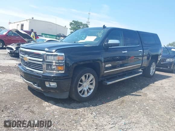 2015 Chevrolet Silverado 1500 High Country z VIN 3GCPCTEC7FG385328, wystawiony jako IAAI lot #43036924 z przebiegiem 155 391 mil mil oraz . Historia ofert i sprzedaży dostępna na DreamBid. Obrazek 2.