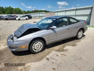 1997 Saturn 2dr Coupe с VIN 1G8ZH127XVZ108543, выставлен на аукционе Copart как лот 62389165 с пробегом 60 100 миль миль и На запчасти • Non repairable. История ставок и продаж доступна на DreamBid. Изображение 1.