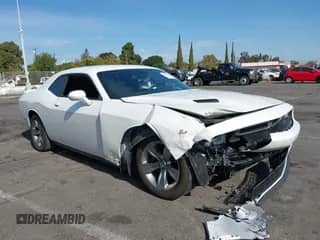 2019 Dodge Challenger SXT with VIN 2C3CDZAG1KH551333, listed as a IAAI auction lot 43243129 with 67,405 mi miles and . Bid and sale history available at DreamBid. Image 1.