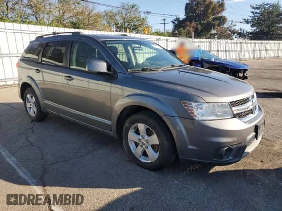 2012 Dodge Journey SXT z VIN 3C4PDCBG4CT396259, wystawiony jako Copart lot #85880665 z przebiegiem 173 504 mil mil oraz Szkoda całkowita • Salvage title. Historia ofert i sprzedaży dostępna na DreamBid. Obrazek 4.