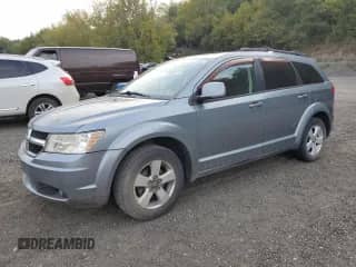 2010 Dodge Journey SXT with VIN 3D4PG5FV7AT117950, listed as a Copart auction lot 82028075 with 65,015 mi miles and Salvage title. Bid and sale history available at DreamBid. Image 1.