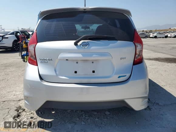 2016 Nissan Note SR z VIN 3N1CE2CP0GL382467, wystawiony jako Copart lot #68520655 z przebiegiem 118 746 mil mil oraz Szkoda całkowita • Salvage title. Historia ofert i sprzedaży dostępna na DreamBid. Obrazek 6.