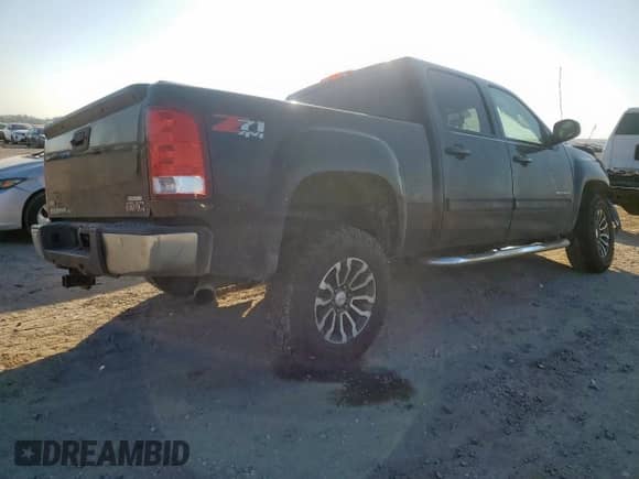 2011 GMC Sierra 1500 SLT z VIN 3GTP2WE30BG398100, wystawiony jako Copart lot #82204295 z przebiegiem 291 038 mil mil oraz Szkoda całkowita • Salvage title. Historia ofert i sprzedaży dostępna na DreamBid. Obrazek 3.