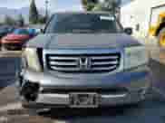 2013 Honda Pilot EX with VIN 5FNYF3H40DB039060, listed as a Copart auction lot 55322705 with 127,739 mi miles and Salvage title. Bid and sale history available at DreamBid. Image 5.
