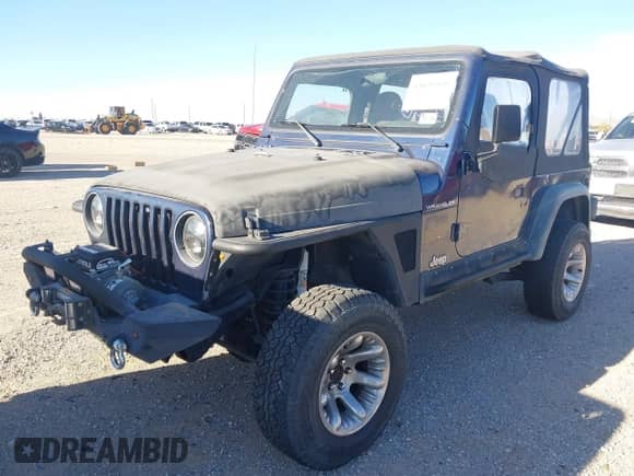 1997 Jeep Wrangler SE with VIN 1J4FY29P9VP452231, listed as a IAAI auction lot 43459509 with Not provided miles and . Bid and sale history available at DreamBid. Image 2.