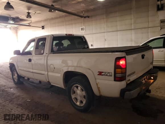 2006 GMC Sierra 1500 SLE1 with VIN 1GTEK19B66Z174802, listed as a Copart auction lot 48564885 with 166,074 mi miles and Salvage title. Bid and sale history available at DreamBid. Image 2.