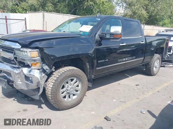 2015 Chevrolet Silverado 3500HD with VIN 1GC1K0EG5FF512945, listed as a IAAI auction lot 43138447 with 91,028 mi miles and . Bid and sale history available at DreamBid. Image 2.