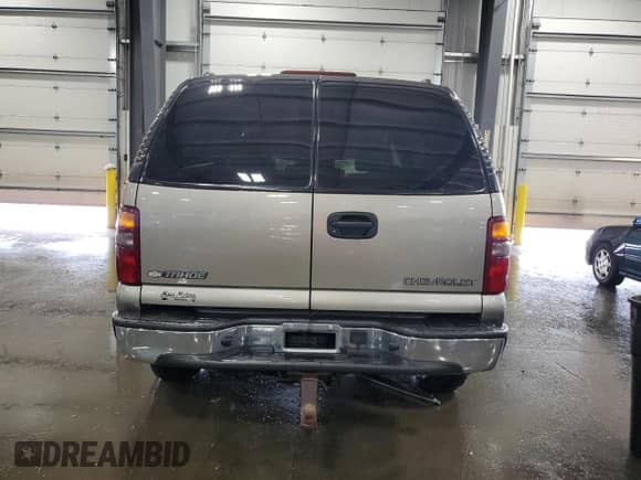 2003 Chevrolet Tahoe LS with VIN 1GNEK13V03J300463, listed as a Copart auction lot 65970125 with 74,950 mi miles and Salvage title. Bid and sale history available at DreamBid. Image 6.