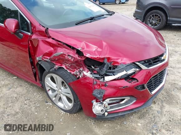 2017 Chevrolet Cruze Premier z VIN 1G1BF5SM8H7226352, wystawiony jako IAAI lot #42875280 z przebiegiem 62 830 mil mil oraz . Historia ofert i sprzedaży dostępna na DreamBid. Obrazek 6.