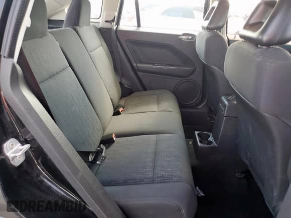 2008 Dodge Caliber SE z VIN 1B3HB28B88D701583, wystawiony jako Copart lot #62349225 z przebiegiem 173 377 mil mil oraz Szkoda całkowita • Salvage title. Historia ofert i sprzedaży dostępna na DreamBid. Obrazek 11.