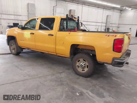 2015 Chevrolet Silverado 2500HD Work Truck z VIN 1GC1KUEG7FF622225, wystawiony jako IAAI lot #42516923 z przebiegiem 71 555 mil mil oraz . Historia ofert i sprzedaży dostępna na DreamBid. Obrazek 3.