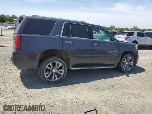 2016 Chevrolet Tahoe LTZ with VIN 1GNSCCKC0GR203654, listed as a Copart auction lot 54906895 with 74,805 mi miles and Salvage title. Bid and sale history available at DreamBid. Image 3.