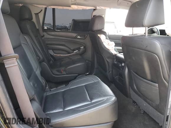 2015 Chevrolet Tahoe LT z VIN 1GNSCBKC1FR734189, wystawiony jako Copart lot #64049525 z przebiegiem 148 346 mil mil oraz Szkoda całkowita • Salvage title. Historia ofert i sprzedaży dostępna na DreamBid. Obrazek 11.