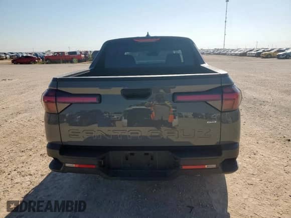 2024 Hyundai Santa Cruz SE с VIN 5NTJADDE1RH104996, выставлен на аукционе Copart как лот 68031805 с пробегом 27 248 миль миль и Списание • Salvage title. История ставок и продаж доступна на DreamBid. Изображение 6.