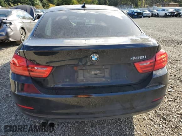 2015 BMW 4 Series 428i z VIN WBA4A5C59FG051335, wystawiony jako Copart lot #82312585 z przebiegiem 157 280 mil mil oraz Czysty tytuł • Clean title. Historia ofert i sprzedaży dostępna na DreamBid. Obrazek 6.