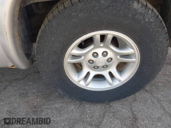 2001 Dodge Dakota with VIN 1B7GG22XX1S348751, listed as a IAAI auction lot 42077395 with 148,034 mi miles and . Bid and sale history available at DreamBid. Image 12.