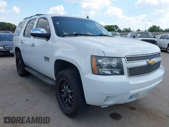2013 Chevrolet Tahoe LS z VIN 1GNSCAE09DR120953, wystawiony jako IAAI lot #43337822 z przebiegiem 218 955 mil mil oraz . Historia ofert i sprzedaży dostępna na DreamBid. Obrazek 1.