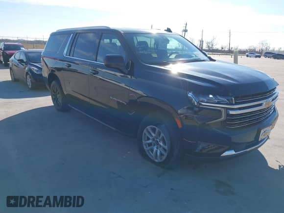 2022 Chevrolet Suburban LT z VIN 1GNSCCKD5NR193578, wystawiony jako IAAI lot #41307465 z przebiegiem 74 027 mil mil oraz . Historia ofert i sprzedaży dostępna na DreamBid. Obrazek 1.