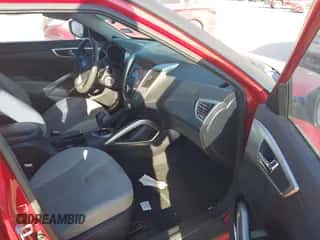 2012 Hyundai Veloster w/Gray Int with VIN KMHTC6AD0CU074696, listed as a IAAI auction lot 43383748 with 140,707 mi miles and . Bid and sale history available at DreamBid. Image 5.