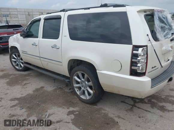 2013 Chevrolet Suburban LTZ z VIN 1GNSCKE00DR209381, wystawiony jako IAAI lot #42469271 z przebiegiem Nie podano mil oraz . Historia ofert i sprzedaży dostępna na DreamBid. Obrazek 3.