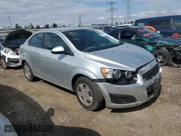 2015 Chevrolet Sonic LS с VIN 1G1JA5SH4F4160328, выставлен на аукционе Copart как лот 81609315 с пробегом 37 610 миль миль и Списание • Salvage title. История ставок и продаж доступна на DreamBid. Изображение 4.