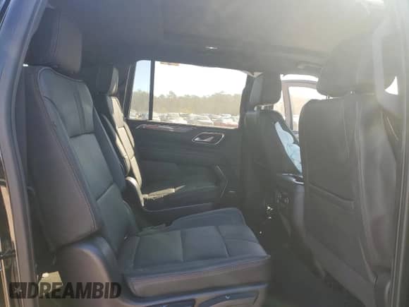 2022 Chevrolet Suburban RST with VIN 1GNSKEKL1NR128748, listed as a Copart auction lot 81796424 with 77,017 mi miles and Salvage title. Bid and sale history available at DreamBid. Image 11.