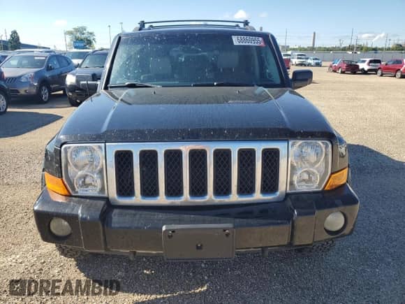 2007 Jeep Commander Overland z VIN 1J8HG68287C633175, wystawiony jako Copart lot #68860955 z przebiegiem 182 048 mil mil oraz Szkoda całkowita • Salvage title. Historia ofert i sprzedaży dostępna na DreamBid. Obrazek 5.