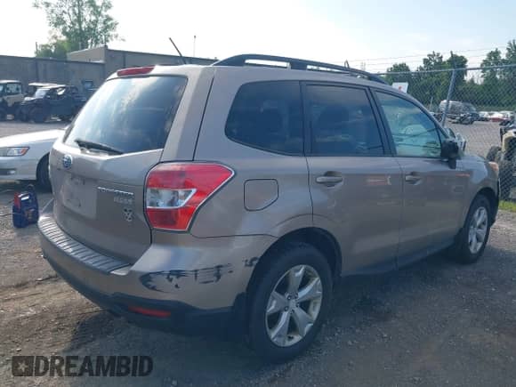 2014 Subaru Forester Premium with VIN JF2SJACC4EG405795, listed as a IAAI auction lot 42762451 with 267,393 mi miles and . Bid and sale history available at DreamBid. Image 4.