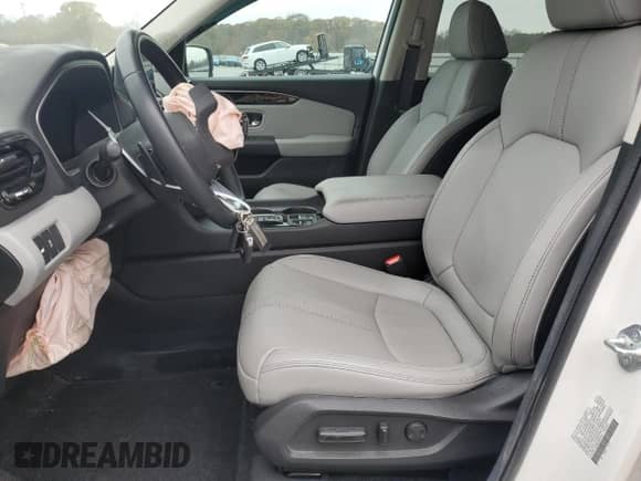 2023 Honda Pilot EX-L z VIN 5FNYG2H58PB001919, wystawiony jako Copart lot #81365014 z przebiegiem 13 624 mil mil oraz Szkoda całkowita • Salvage title. Historia ofert i sprzedaży dostępna na DreamBid. Obrazek 7.