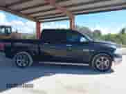 2014 Ram 1500 Laramie with VIN 1C6RR6NT2ES319969, listed as a IAAI auction lot 43512010 with 188,924 mi miles and . Bid and sale history available at DreamBid. Image 13.