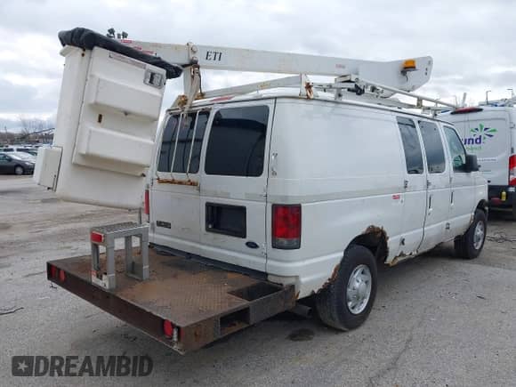 2008 Ford Econoline Cargo Commercial with VIN 1FTSE34L38DA85713, listed as a IAAI auction lot 41789119 with 182,002 mi miles and . Bid and sale history available at DreamBid. Image 4.