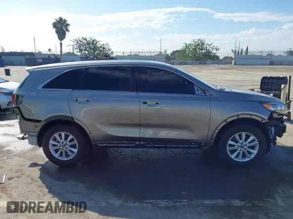 2019 Kia Sorento LX with VIN 5XYPG4A30KG546045, listed as a IAAI auction lot 43427534 with 61,825 mi miles and . Bid and sale history available at DreamBid. Image 14.