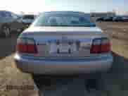 1997 Honda Accord LX with VIN 1HGCD5630VA809341, listed as a Copart auction lot 54182105 with 223,707 mi miles and Salvage title. Bid and sale history available at DreamBid. Image 6.