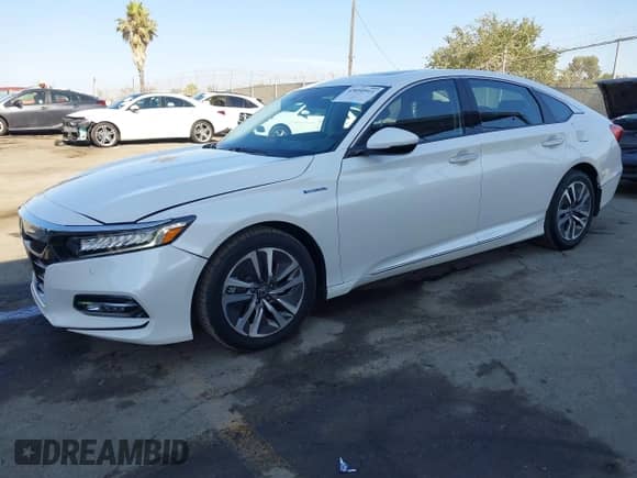 2018 Honda Accord Touring with VIN 1HGCV3F9XJA016936, listed as a IAAI auction lot 43050911 with 69,598 mi miles and . Bid and sale history available at DreamBid. Image 2.